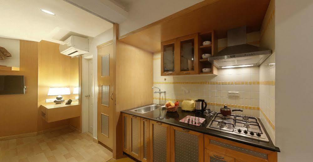 Melange Luxury Service Apartment Бангалор Екстериор снимка